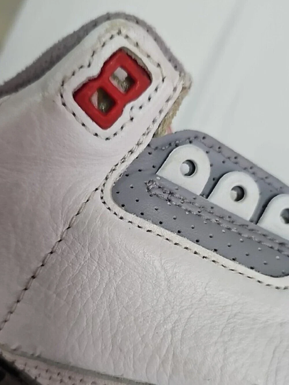 Jordan Men’s White/Gray/Red Retro Sneakers